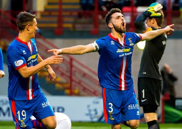 Inverness captain Graeme Shinnie (right) and Danny Williams celebrate after Hamilton's Grant Gillespie scores a own goal to put the visitors ahead. Picture: SNS