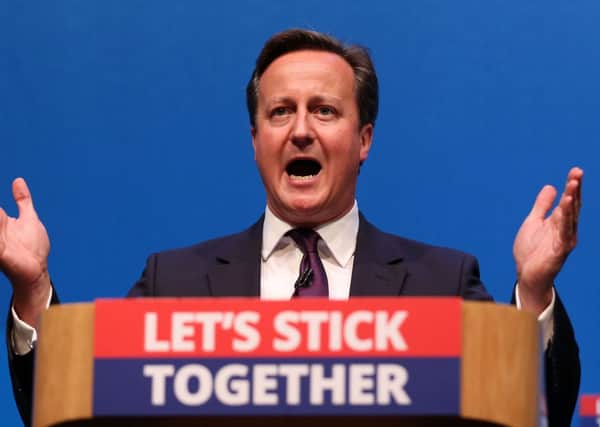David Cameron will introduce a reduction to the benefits cap as soon as the Tories are elected, he said. Picture: PA