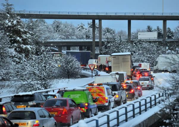 Motorists in central and southern parts of Scotland have been warned to brace themselves for potential snow disruption from tomorrow. Picture: Robert Perry