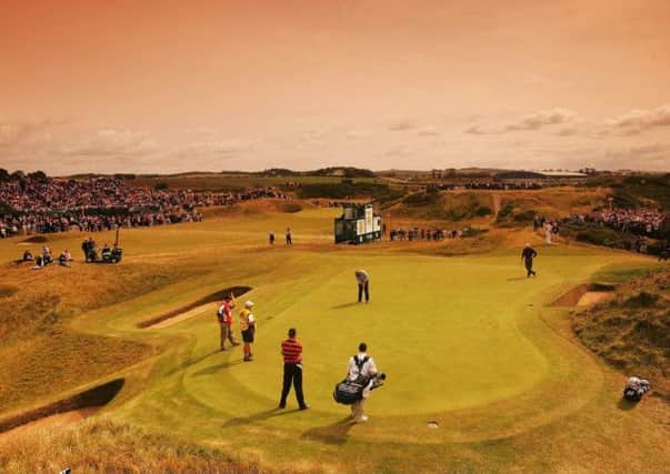 Colin Montgomerie putts on Royal Troon's 'Postage Stamp' 8th hole during the 133rd Open in 2004. Picture: Getty