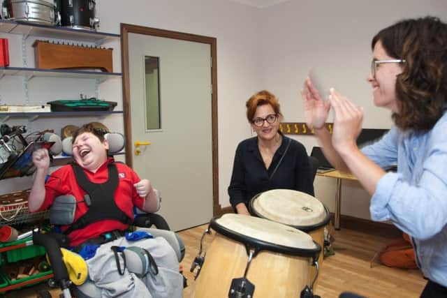 Barbara Dickson visits a Nordoff Robbins music therapy session. Picture: Tina Norris