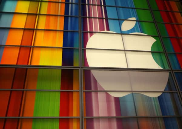 Apple has recorded a record-breaking quarterly profit of nearly 12 billion pounds. Picture: Getty