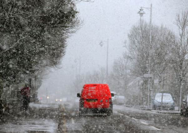 A van driving down Dumbarton Road in Stirling during a snow blizzard. Picture: PA