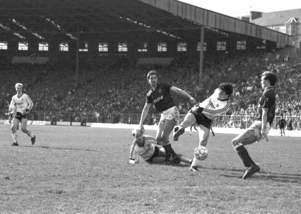 Frank McGarvey scores St Mirren's second goal during the Hearts v St Mirren football match at Tynecastle in April 1987. Picture: TSPL
