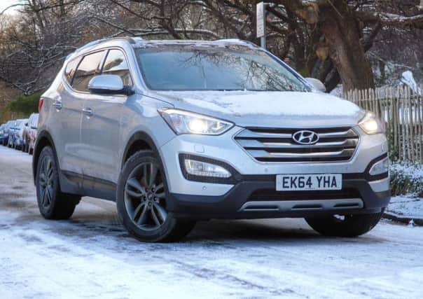 The Hyundai Santa Fe delivers seven seats and four-wheel drive  in a handsome package