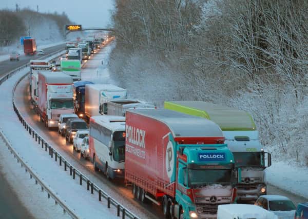 The heavy snow fall caused major tailbacks on the M74 near Larkhall, South Lanarkshire. Picture: Hemedia