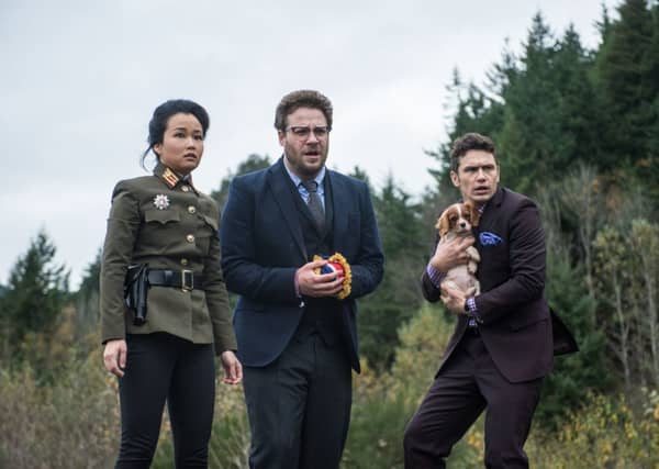 Seth Rogen (centre) with co-star James Franco in The Interview. Picture: Contributed