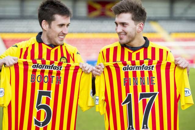 All smiles for Partick Thistle new signing's Callum Booth (left) and Ryan Finnie as they sing with the club until the end of the season. Picture: SNS