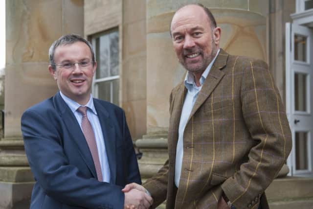 Sir Brian Souter with Fife Chamber vice president John Silcock.