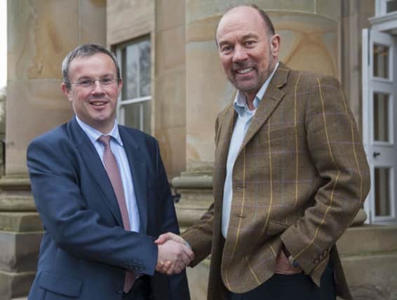 Sir Brian Souter with Fife Chamber vice president John Silcock.