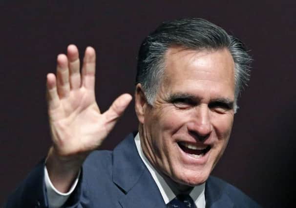 Mitt Romney is all smiles at a Republican event earlier this month. Picture: AP