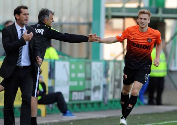 Dundee United's management team are keen to hold on to their star player. Picture: TSPL