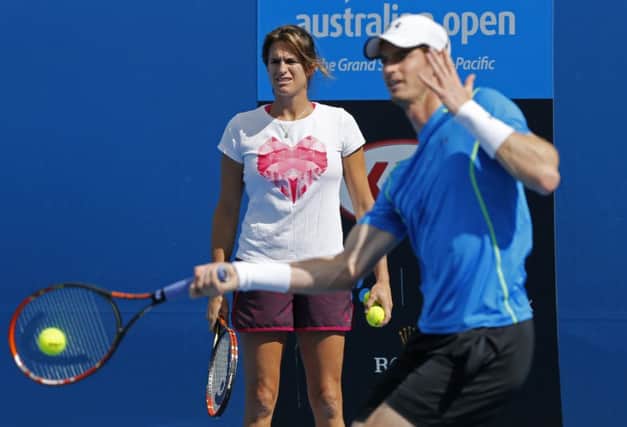 Murray and Amelie Mauresmo during practice in Melbourne yesterday. Picture: AP