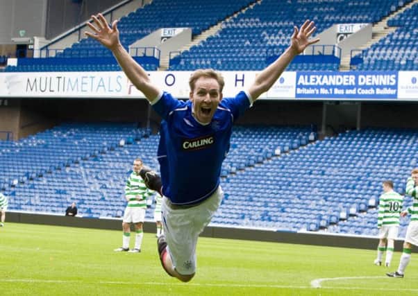 He may be a Celtic fan but for MP and Scottish Labour leader Jim Murphy scoring has to be celebrated even when its in a Rangers strip at Ibrox against a team in hoops in a charity game. Picture: SNS