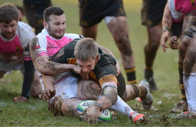 Mike Vernel scores Curries second try despite Bruce Colvines efforts. Picture: Neil Hanna