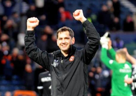 Jackie McNamara salutes the United fans. Picture: Lisa Ferguson