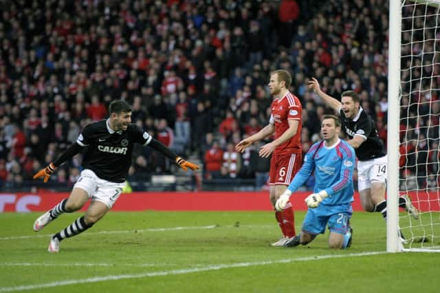 Nadir Ciftci scores the winner for Dundee United. Picture: John Devlin