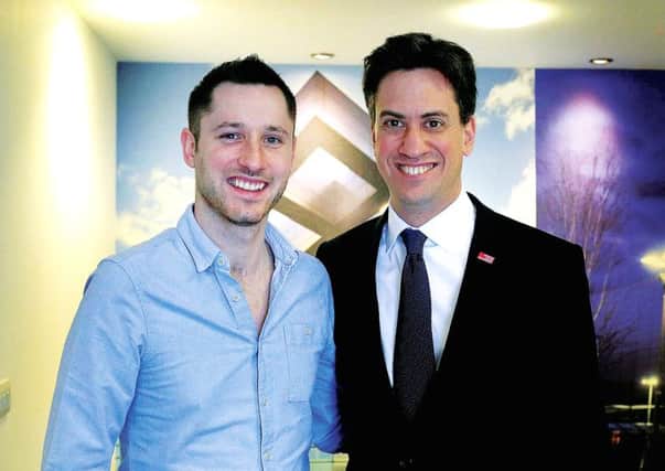 Gordon Aikman with the Labour leader, Ed Miliband, during a visit to the Queenslie Training Centre in Glasgow. Picture: Allan Milligan