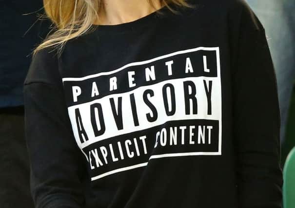Kim Sears sported a 'Parental Advisory: Explicit Content' T-shirt. Picture: Getty