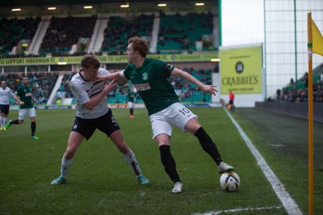 Hibs midfielder Liam Craig looks for an opening against Raith. Picture: Toby Williams