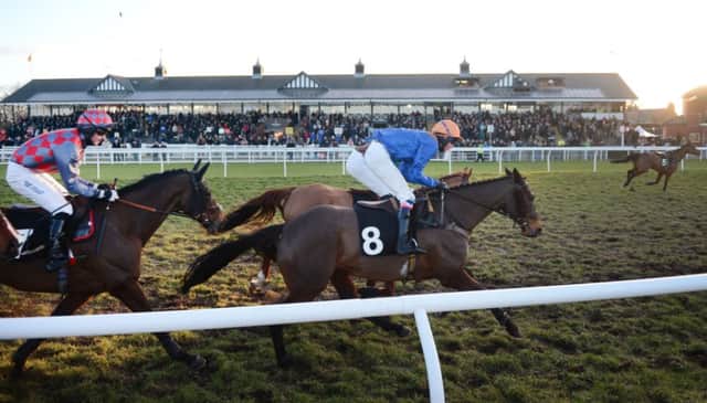 Current Event, left, finished strongly to secure an impressive victory at Musselburgh yesterday. Picture: Neil Hanna