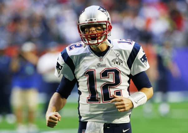Tom Brady, 37, roars with delight as the New England Patriots win the Superbowl for the first time in 10 years. Picture: Getty
