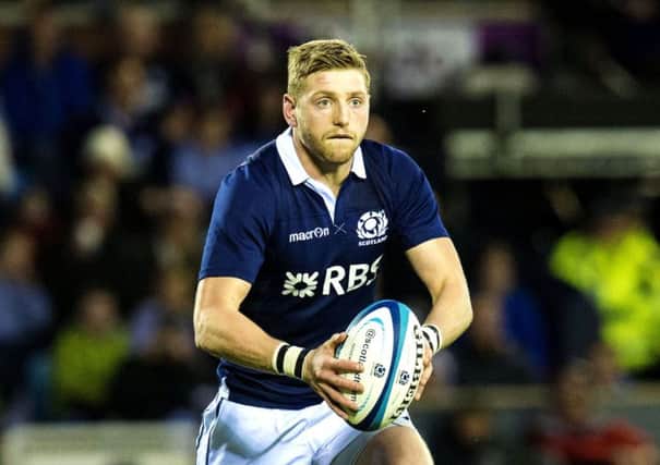 Finn Russell spent three years as a stonemason before carving out a rugby career. Picture: SNS
