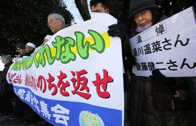 Muslims living in Japan joined an interfaith prayer vigil  in in Tokyo. Picture: AP