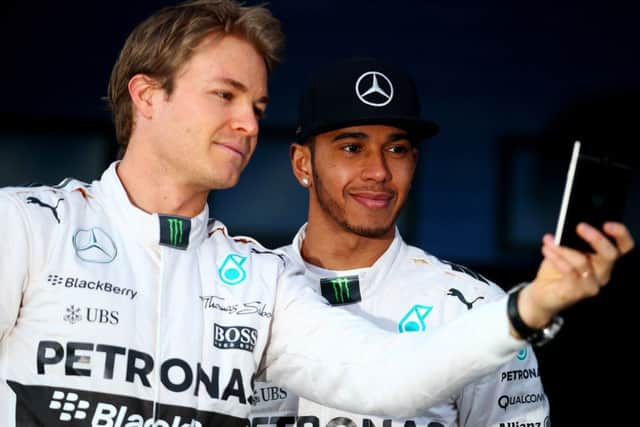 Nico Rosberg, left, and Lewis Hamilton take a selfie in Jerez. Picture: Getty
