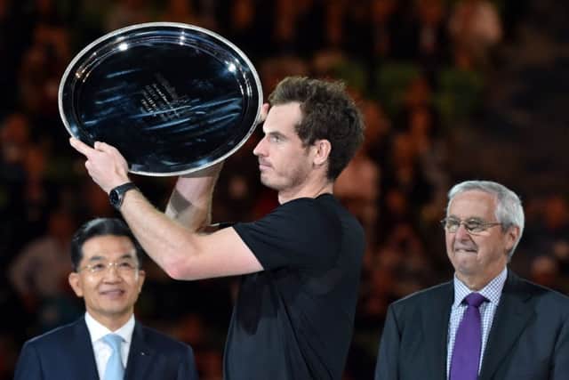 Andy Murray with the Australian Open runnerup trophy. Picture: Getty
