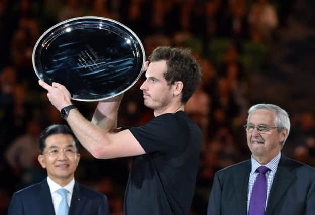 Andy Murray with the Australian Open runnerup trophy. Picture: Getty