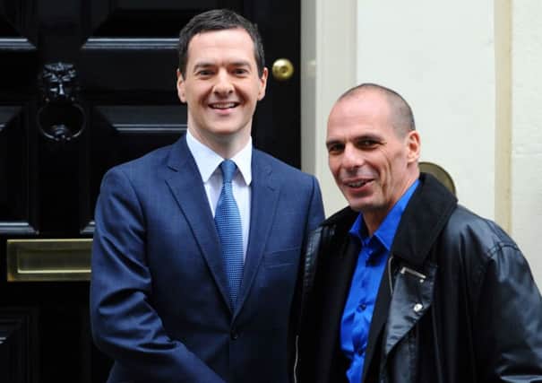 George Osborne greets his Greek counterpart Yanis Varoufakis in Downing Street yesterday. Picture: PA