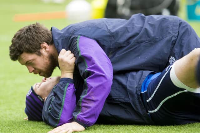 Alasdair Dickinson comes out on top at training yesterday. Picture: SNS