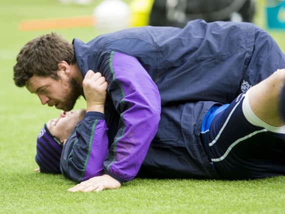 Alasdair Dickinson comes out on top at training yesterday. Picture: SNS