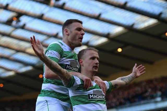 Leigh Griffiths celebrates scoring the opening goal with Anthony Stokes of Celtic on Sunday. Picture: Getty