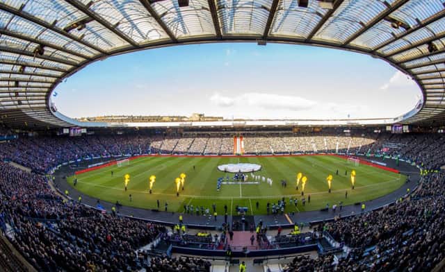 Stage for Sundays showpiece match was a let-down, with the Hampden pitch cutting up badly. Picture: SNS