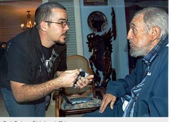 Randy Perdomo Garcia met ex-Cuban president Fidel Castro after an anniversary event. Picture: AP