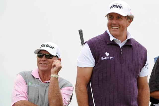 Claude is the son of Butch Harmon, pictured here with Phil Mickelson. Picture: Ian Rutherford