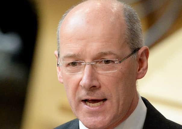 John Swinney says that his budget aims to aid economy. Picture: Getty