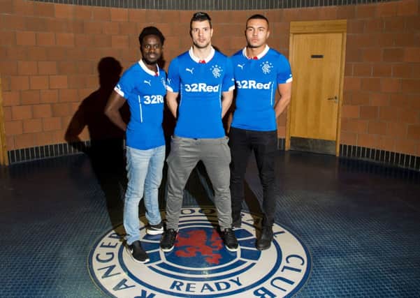 Newcastle players Gael Bigirimana, Haris Vuckic and Remi Streete go on parade at Rangers. Picture: SNS
