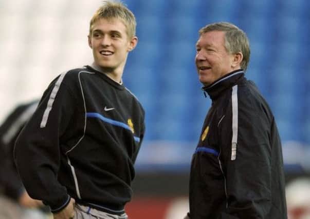 A young Darren Fletcher with the man who signed him, Sir Alex Ferguson. Picture: Getty