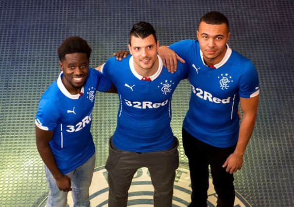 New Rangers signing Haris Vuckic, centre, with fellow recruits Gael Bigirimana, left, and Remie Streete. Picture: SNS
