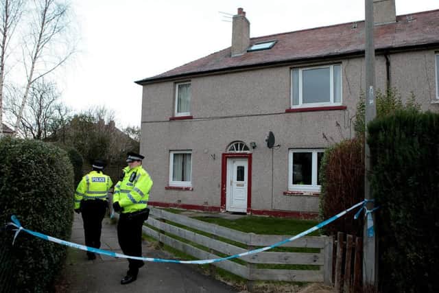 Police at the Longstone home. Picture: HeMedia