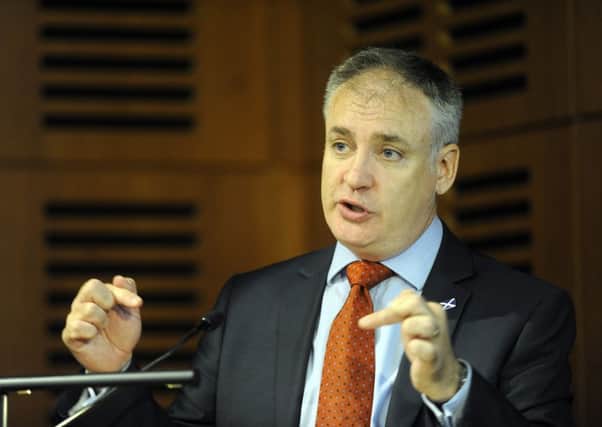 Rural Affairs Secretary Richard Lochhead has called for action at a European level to address the problems facing the dairy industry. Picture: TSPL