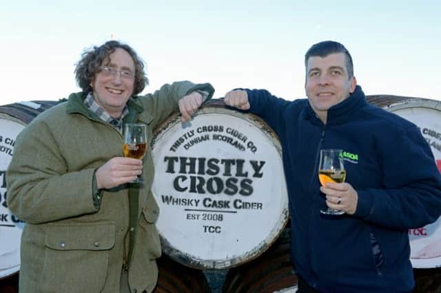 Thistly Cross cider maker Peter Stuart and Asdas Brian OShea. Picture: Ian Georgeson