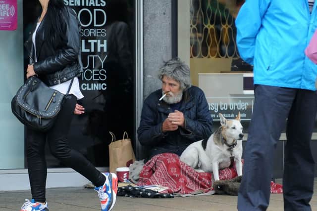 A homeless person on Edinburgh's Princes Street. Picture: TSPL