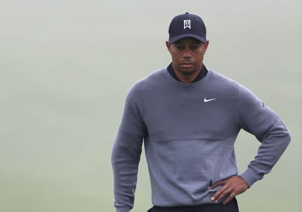 Woods managed only 11 holes in his first round at Torrey Pines before pulling out of the tournament. Picture: Getty