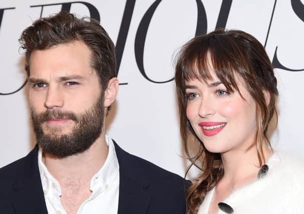 Actors Jamie Dornan and Dakota Johnson attend a Fifty Shades Of Grey publicity event at New York. Picture: Getty