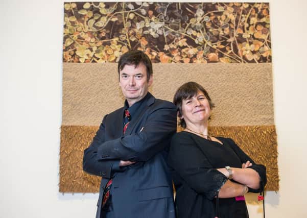 Ian Rankin and Miranda Harvey with the winner of their international tapestry contest. Picture: Ian Georgeson