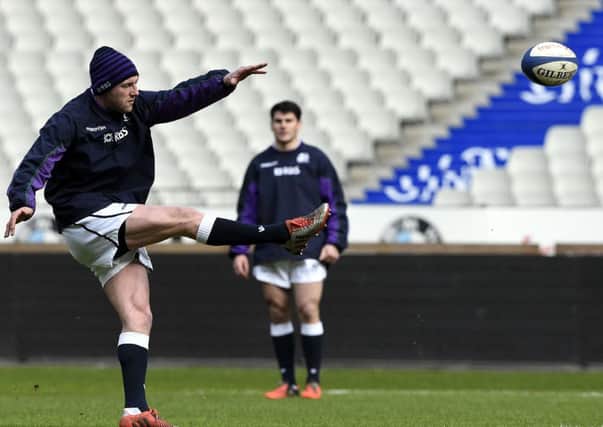 Scotland's fly half Finn Russell kicks the ball during a training session. Picture: Getty